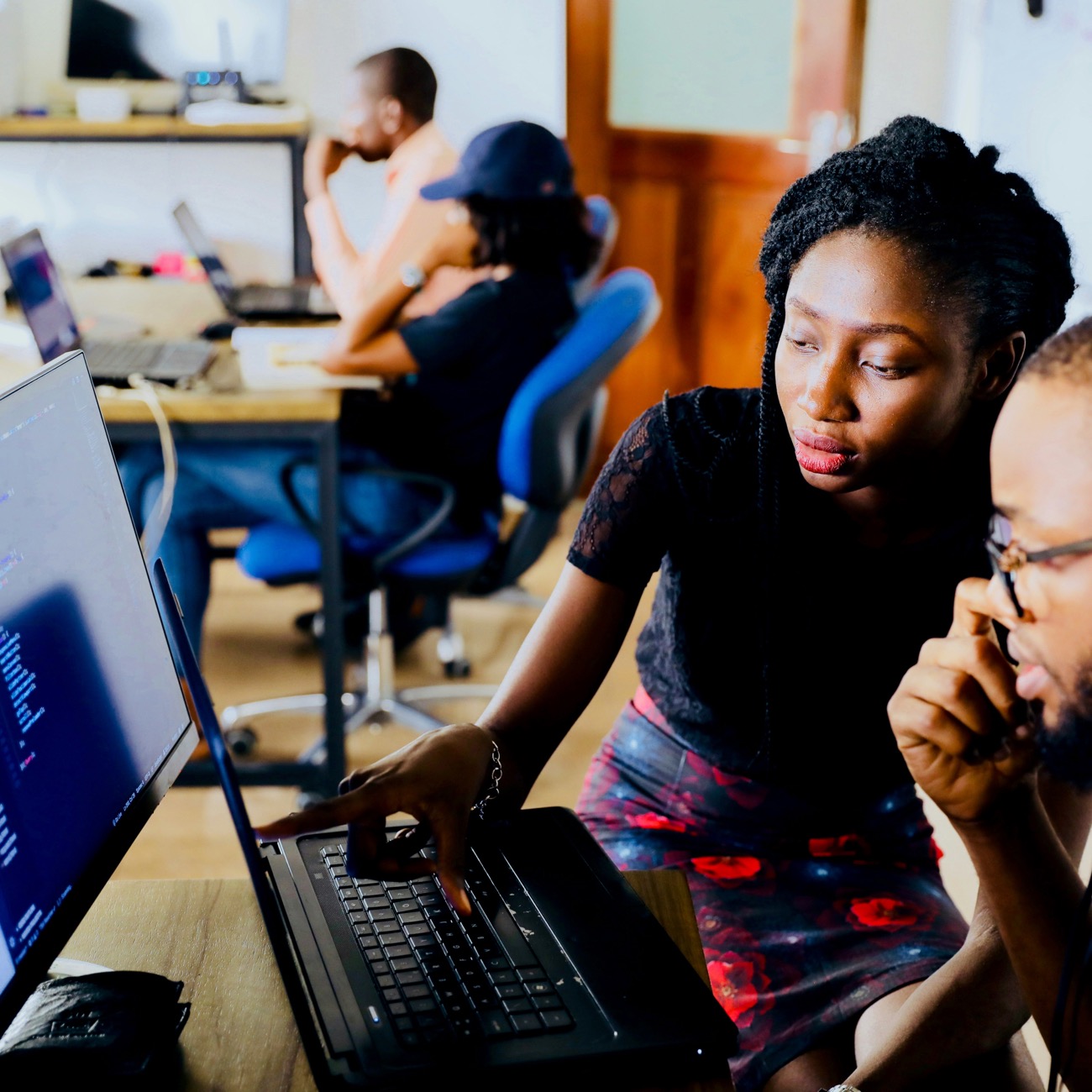 Students learning on a computer