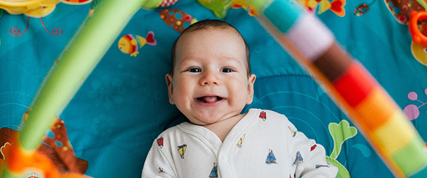 Happy Baby laying down