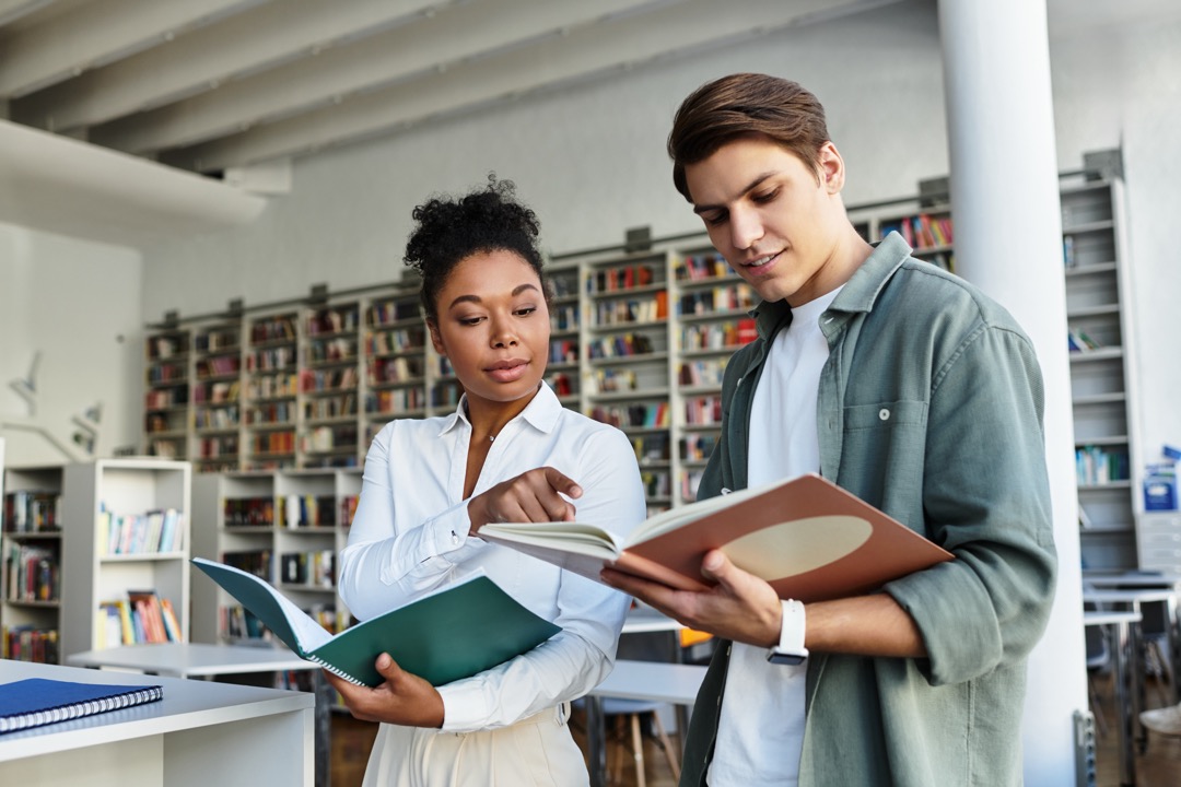 Patrons reading books together