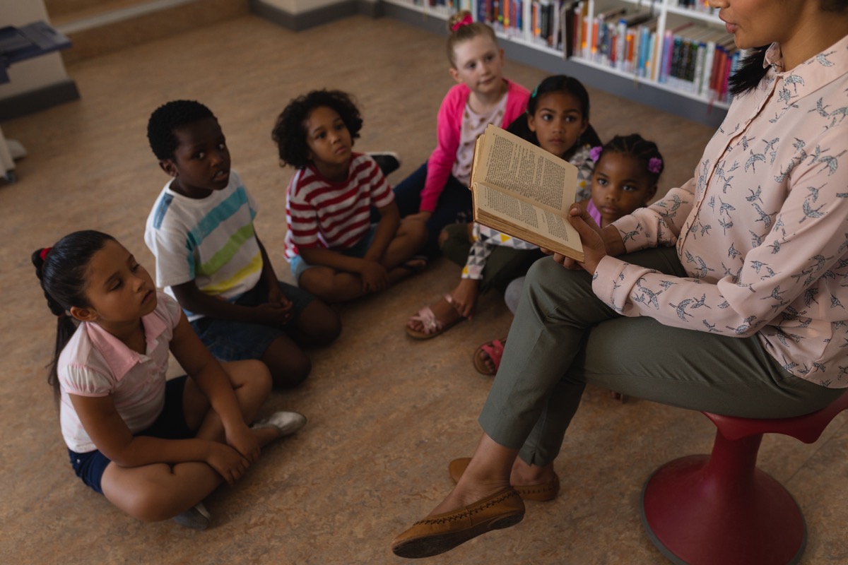 Librarian reading to children