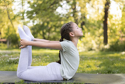 Tween girl doing yoga