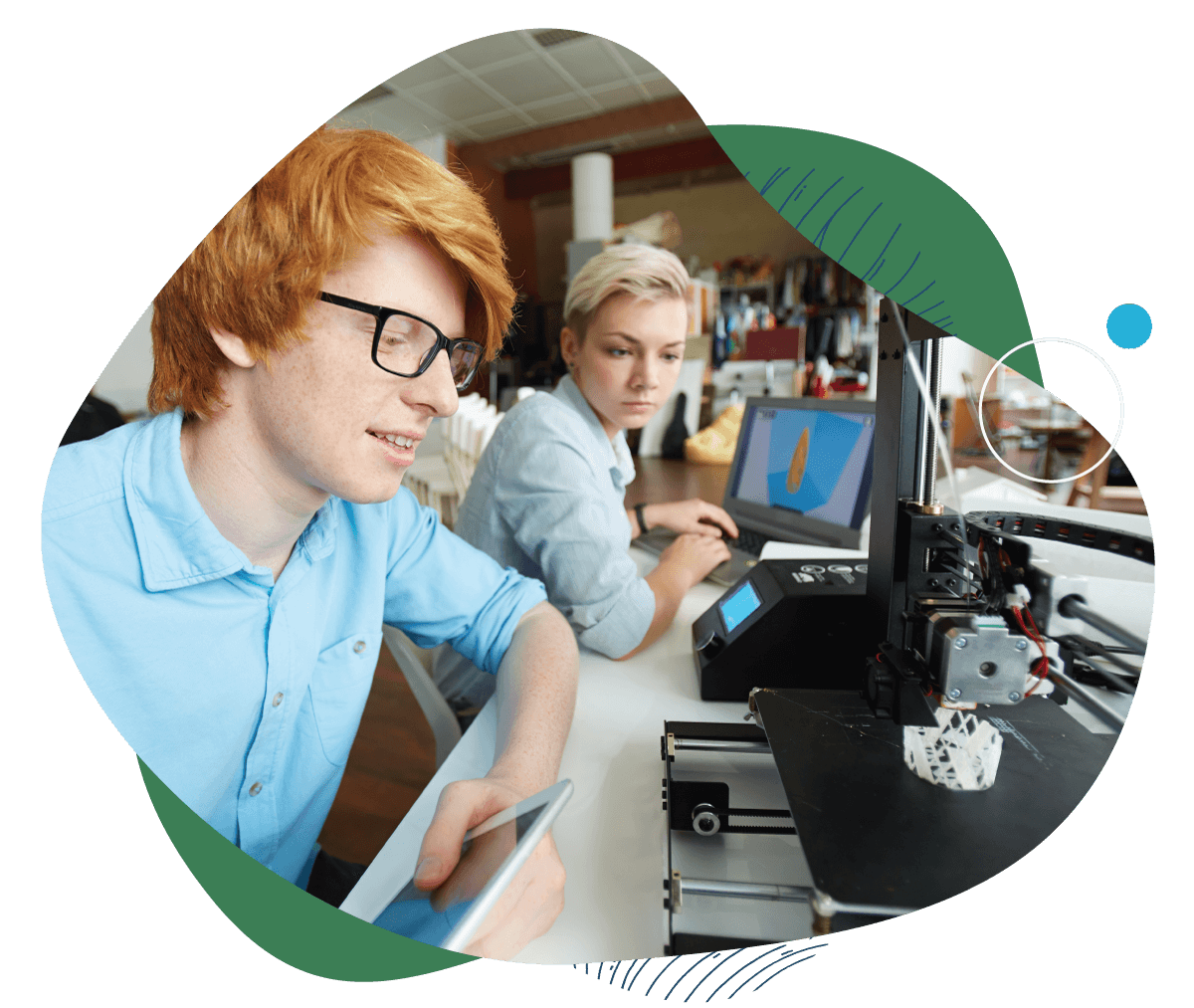 Teens working on a 3d printer