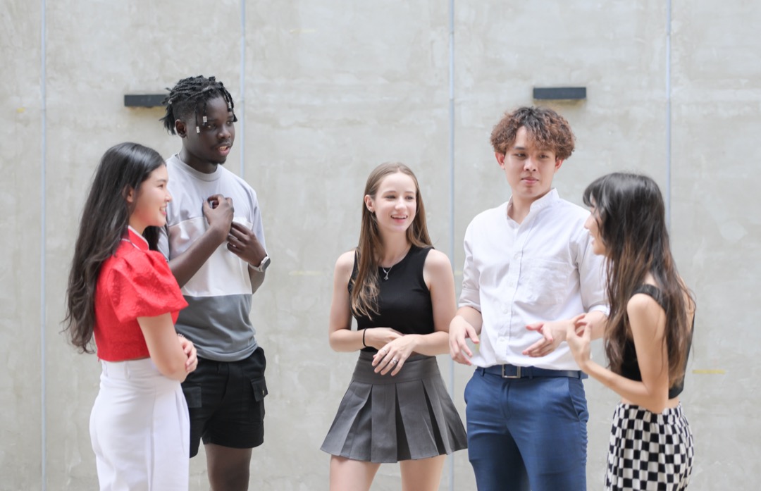 Teens together talking in a group