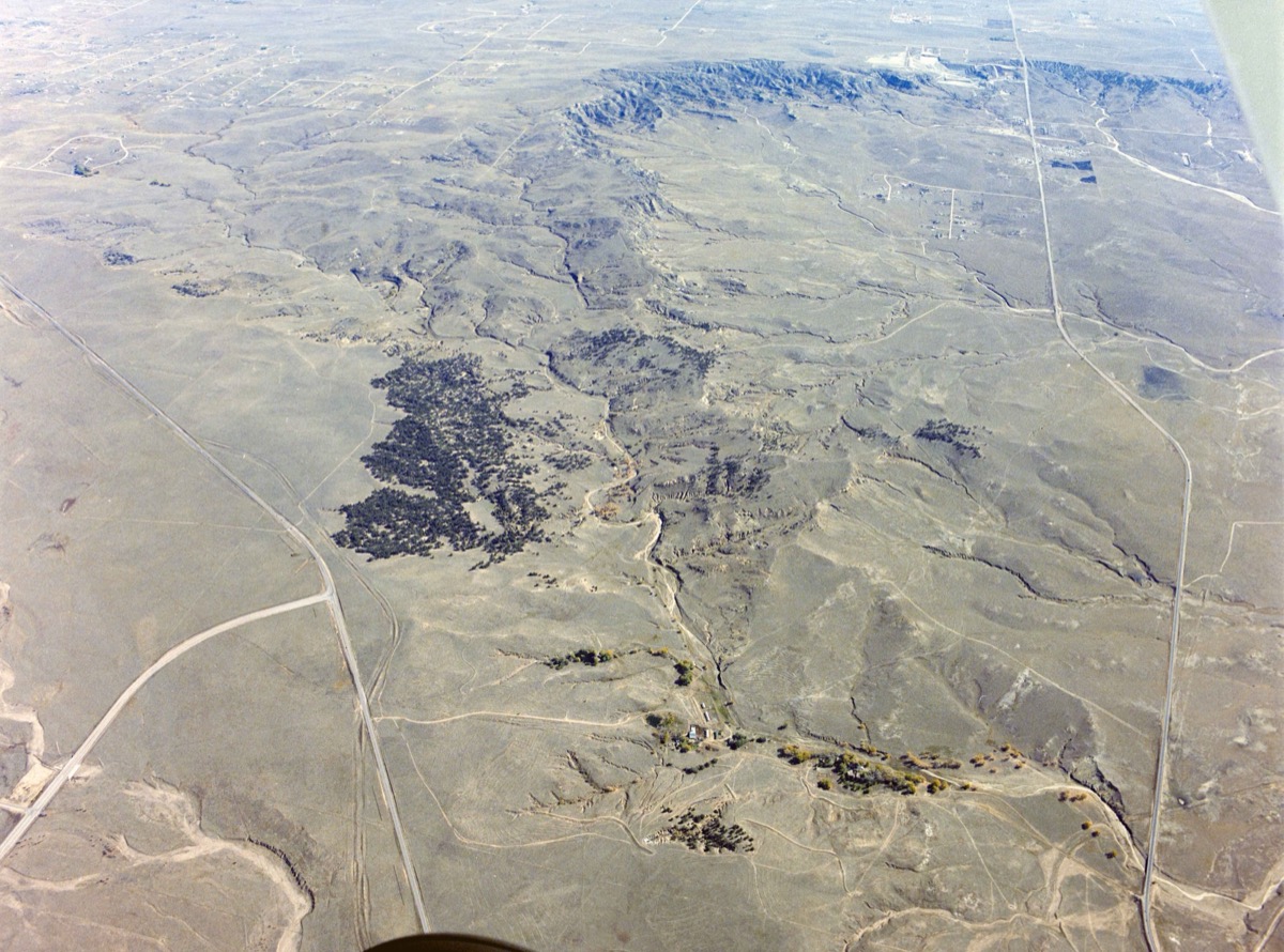 Aerial photo of a sweeping landscape from a plane