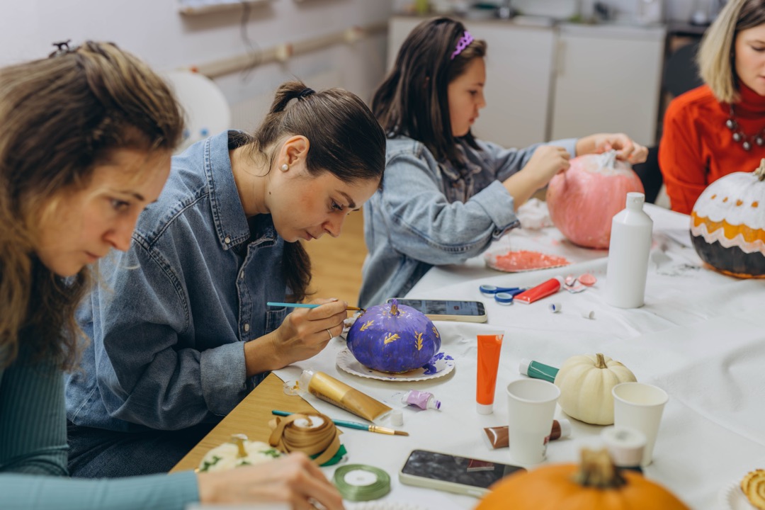 Teens working together on a craft project