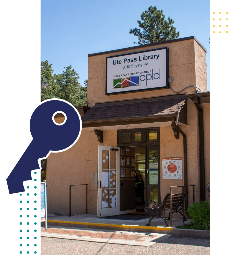 Ute Pass Library entrance with a key icon next to the photo