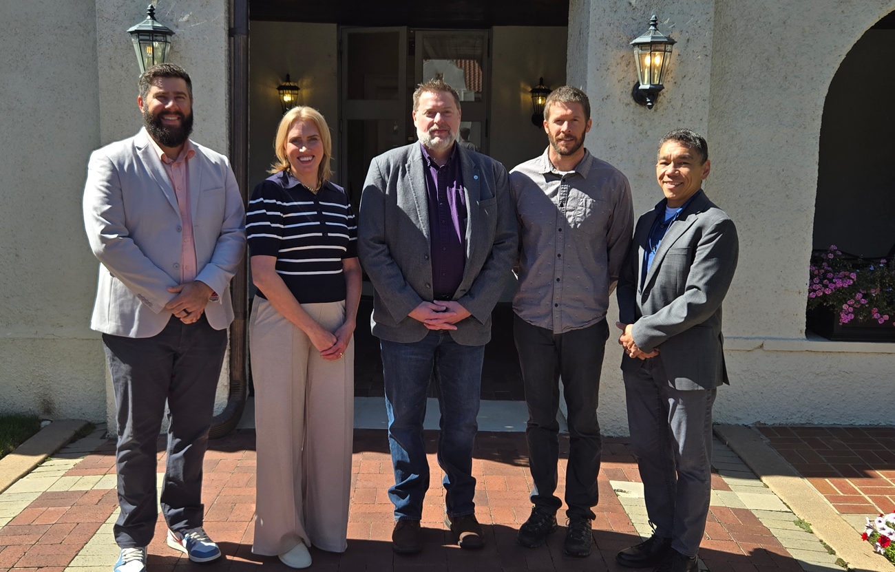 The Board of Trustees of PPLD posting in an outdoor setting in front of a building