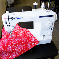 JUKI TL-2010Q Mid-Arm Quilting and Piecing Machine with Automatic Thread Trimmer and Speed Control