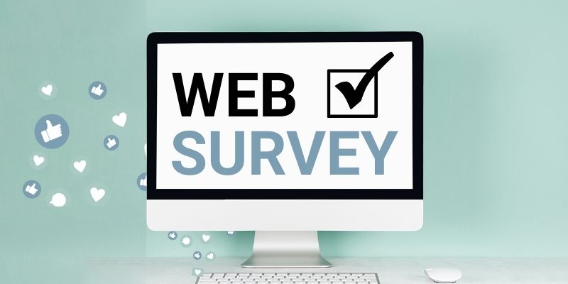 A computer screen with the headline "Web Survey" written on the screen with a black checkmark