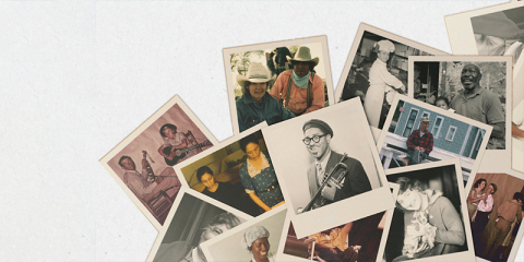 A series of old photographs of family on a table
